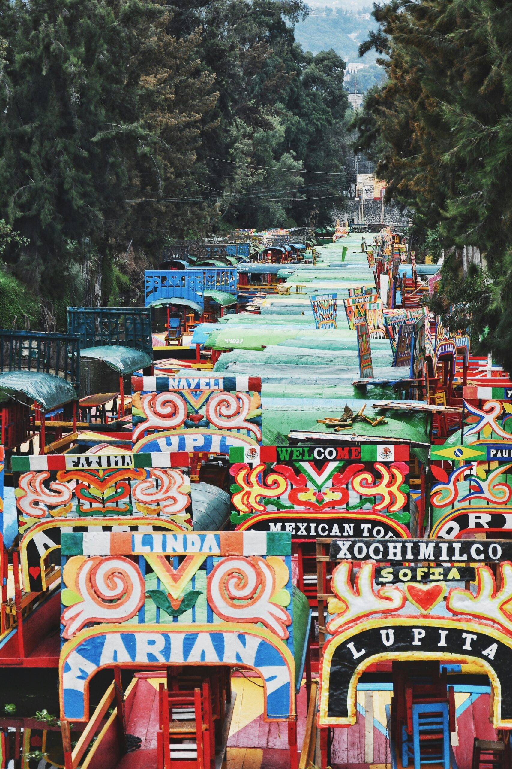Colorful Trajineras in Xochimilco: Exploring ancient traditions in Mexico City, a top cultural experience in CDMX.