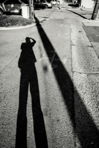Black and white photo of absurd man.