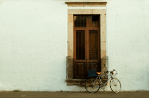 Vintage street scene in Mexico City’s Colonia Roma neighborhood, evoking the nostalgic and melancholic atmosphere of Battles in the Desert — a coming-of-age story featured in books and films about Mexico City.