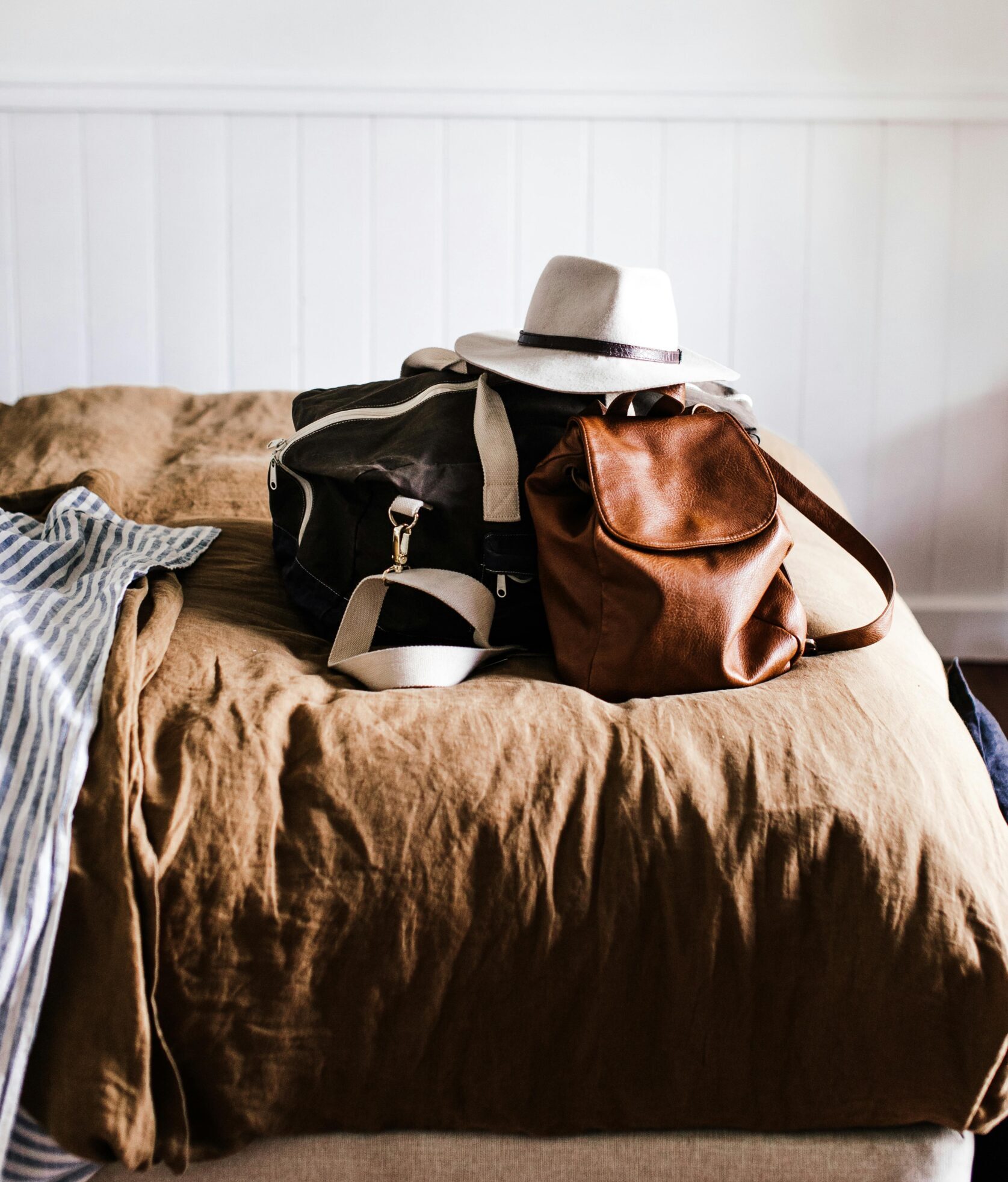 Neutral-toned tops hanging on a rack — capsule wardrobe staples for what to wear in Mexico City