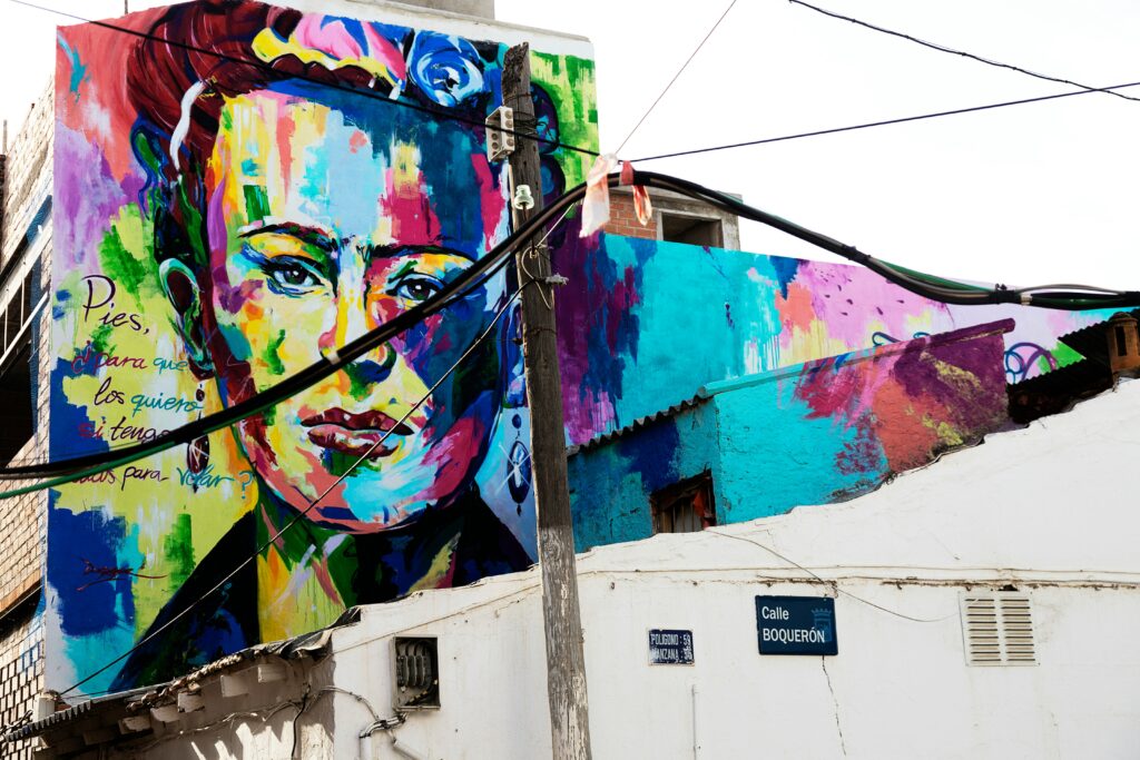 Striking mural of Frida Kahlo in Mexico City, evoking the spirit of her life and legacy featured in the Frida Kahlo Museum