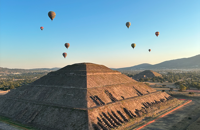 Floating over the pyramids of Teotihuacán at sunrise — a breathtaking Mexico City experience from above