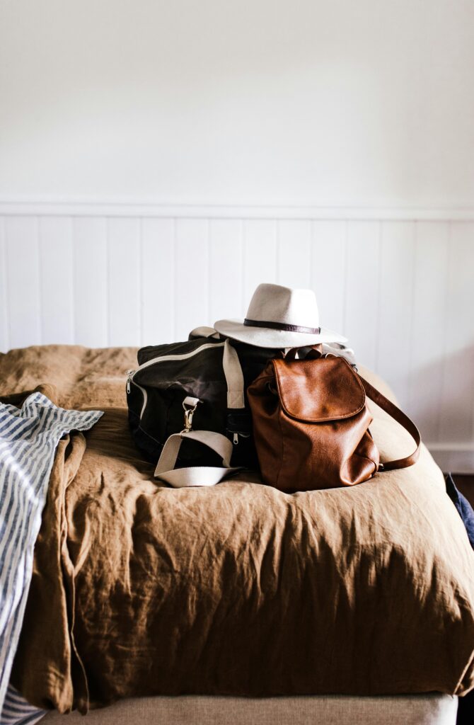 Neutral-toned tops hanging on a rack — capsule wardrobe staples for what to wear in Mexico City